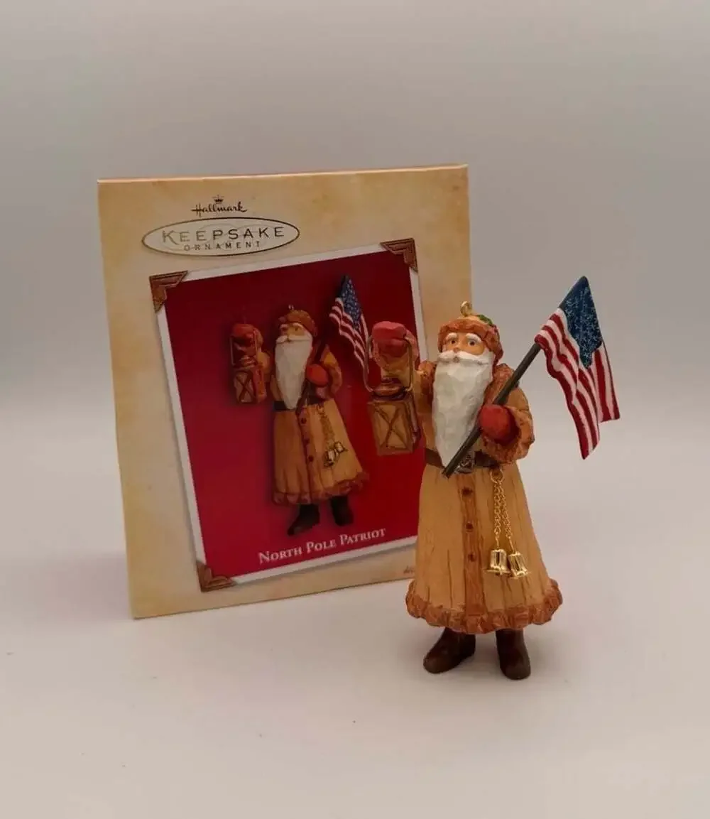2004 Hallmark Keepsake Ornament North Pole Patriot Santa with American Flag